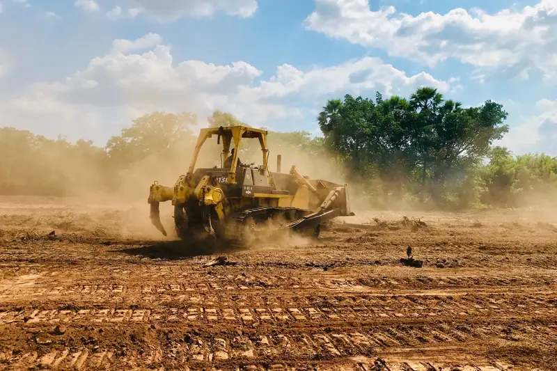 Motor grader working dirt