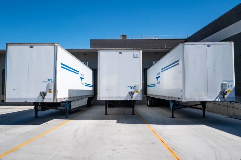 Enclosed trailers lined up for rental