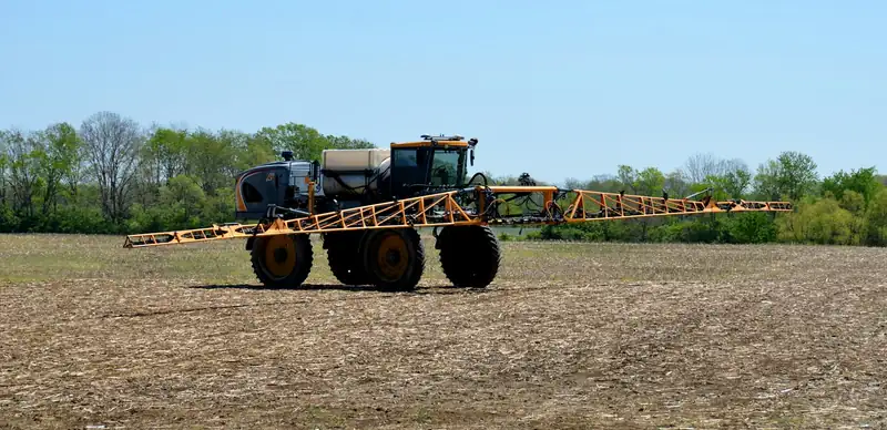 Sprayer rig in an open field